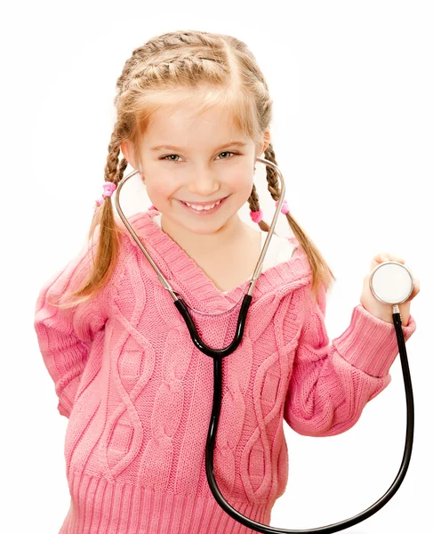 Little girl with stethoscope in hand — Stock Photo, Image