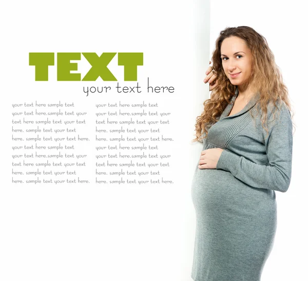 Pregnant woman caressing her belly — Stock Photo, Image