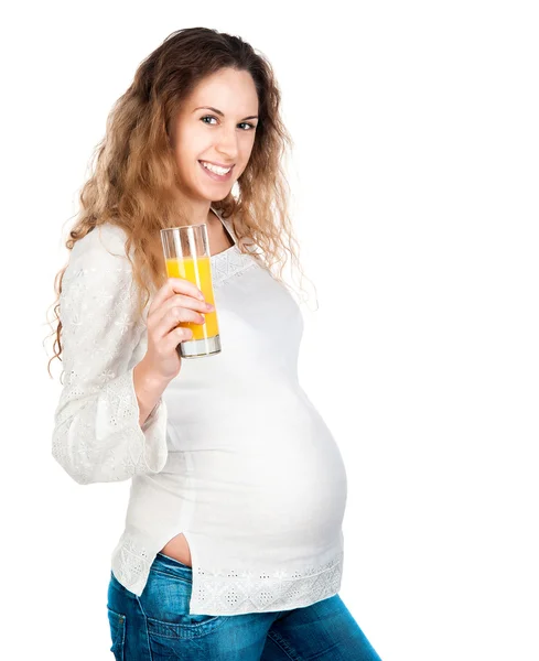 Mujer embarazada con estómago bonita celebración de naranja — Stockfoto