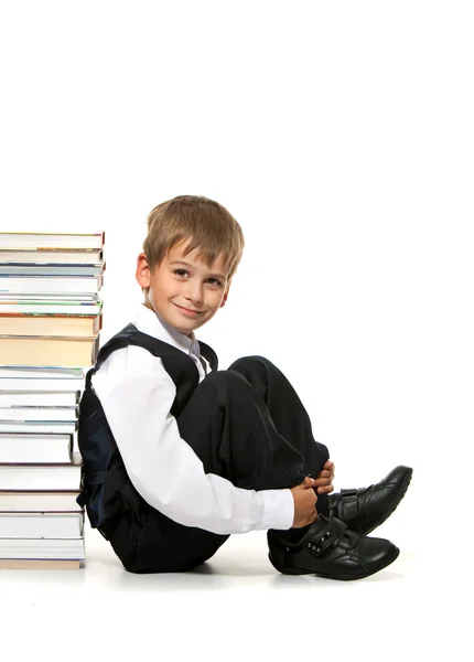 Pojke och böcker — Stockfoto
