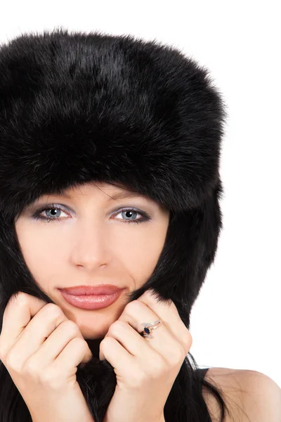 Portrait of a beautiful lady in fur cap — Stock Photo, Image