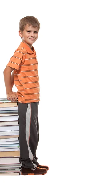 Мальчик и книги — стоковое фото