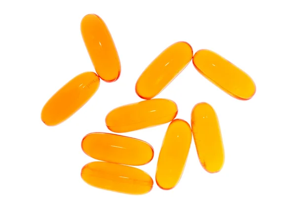 Transparent yellow capsules. — Stock Photo, Image