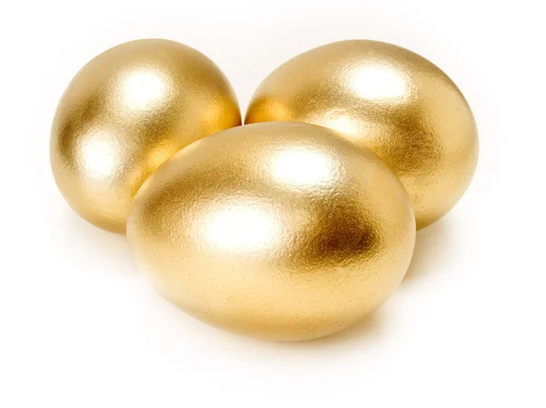 Gouden eieren geïsoleerd op witte achtergrond. — Stockfoto