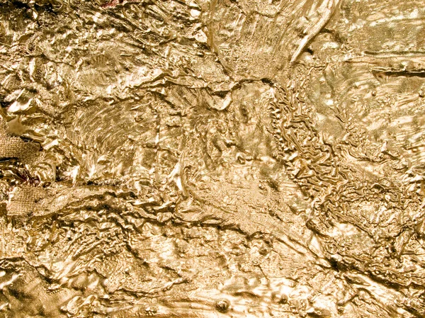 Gouden textuur close-up achtergrond. — Stockfoto