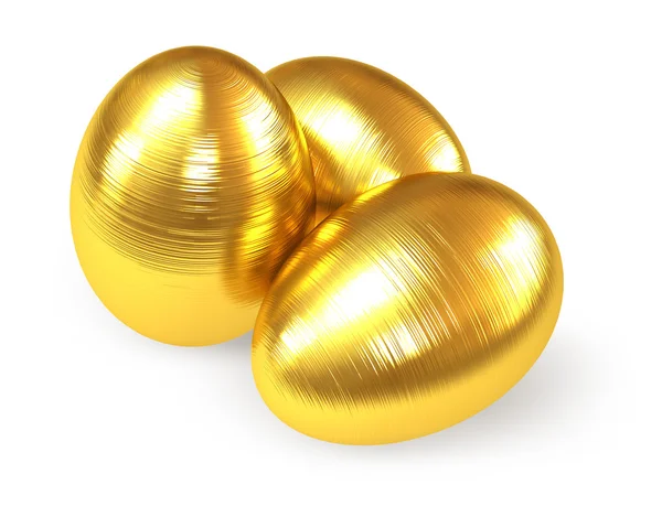 Golden fluted eggs isolated on white background. — Stock Photo, Image