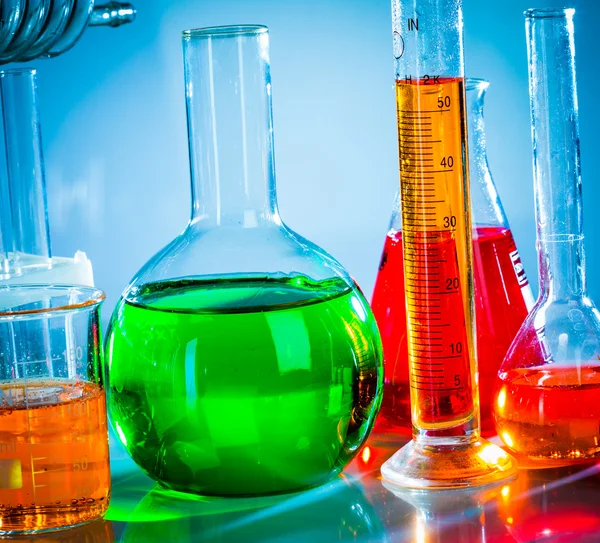 Test tubes with colorful liquids — Stock Photo, Image