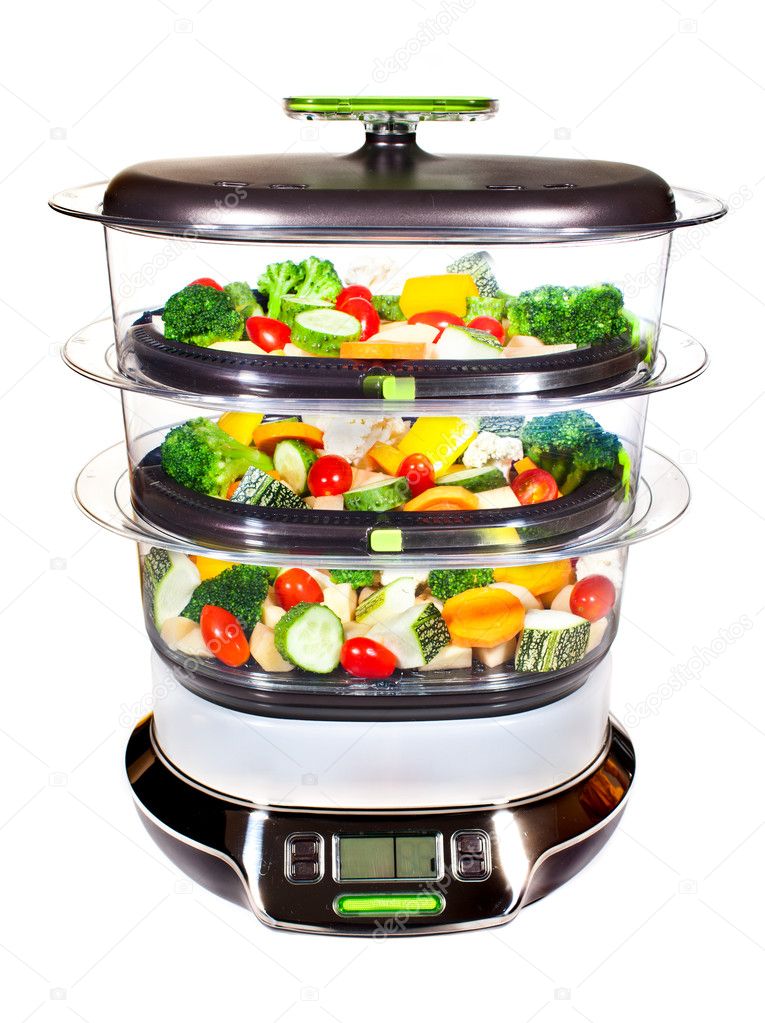 Healthy cooking, steam cooker with vegetables