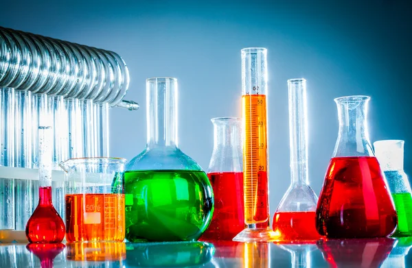 Test tubes with colorful liquids — Stock Photo, Image