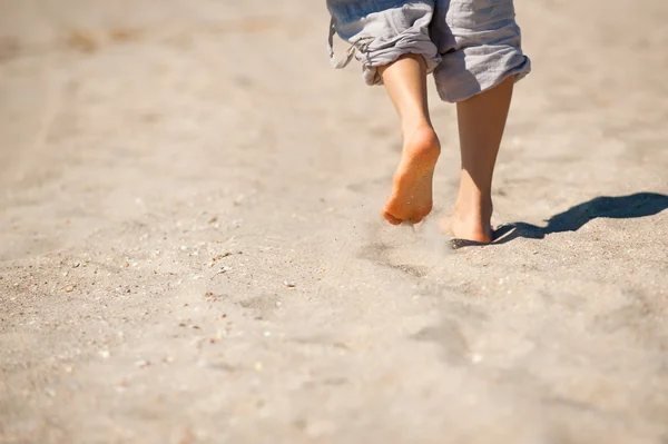 Stock image Walk barefoot on hot sand