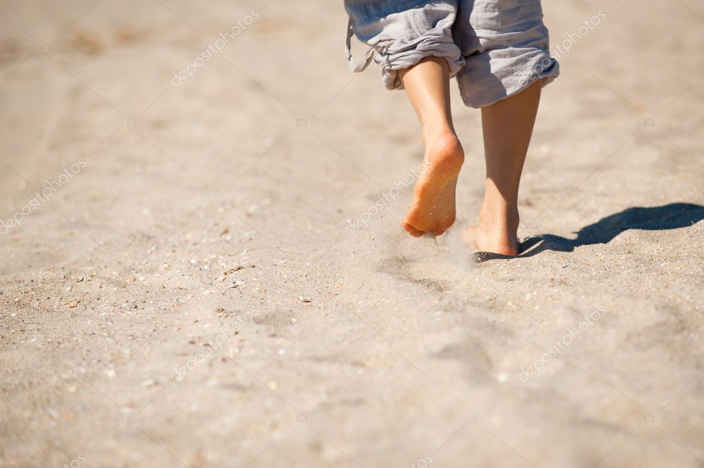 Walk barefoot on hot sand Stock Photo by ©Yarygin 9784498