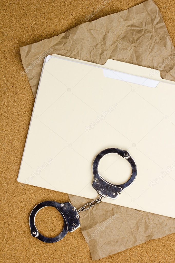 Handcuffs and Folder