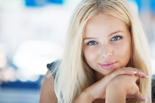 Portrait of a beautiful young blond woman — Stock Photo, Image