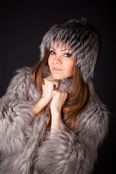 Portrait of a beautiful woman in furs — Stock Photo, Image