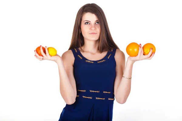 Pretty woman with straight hair with fruits — Stock Photo, Image