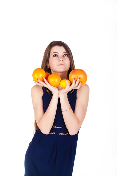 Pretty woman with straight hair with fruits — Stock Photo, Image