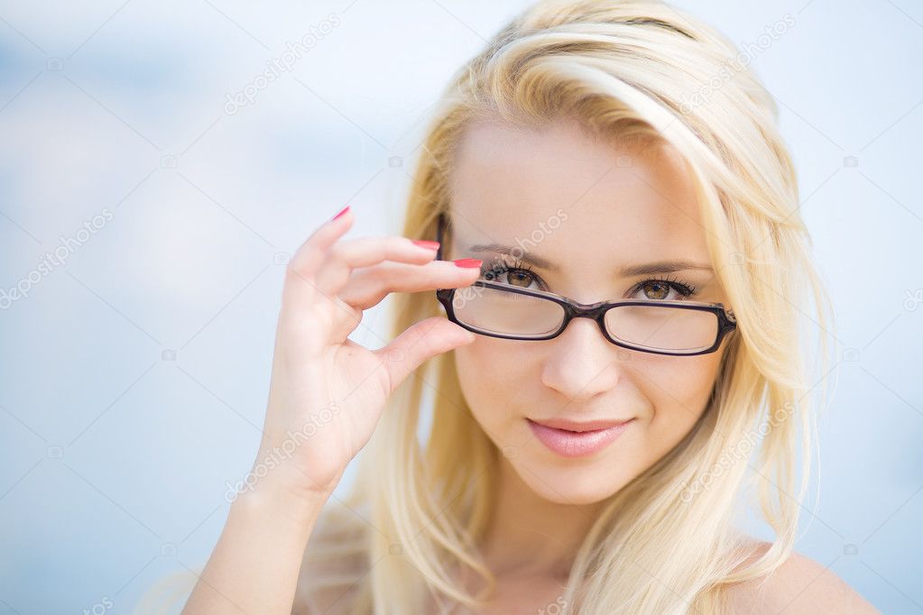 Portrait of a beautiful business woman with glasses