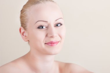 Nude smiling girl with natural make up clipart