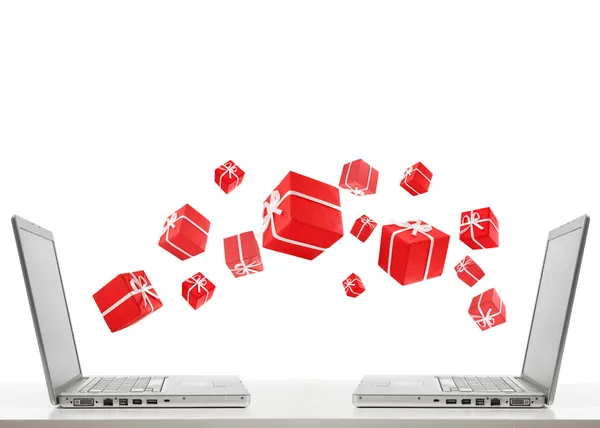 Two laptops and gifts — Stock Photo, Image