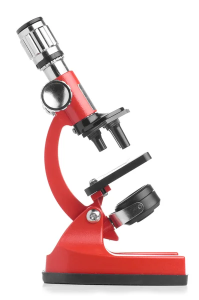 Красный микроскоп — стоковое фото