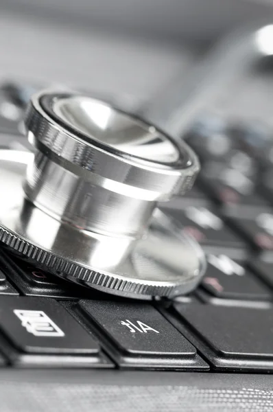 Stethoscope on keyboard — Stock Photo, Image