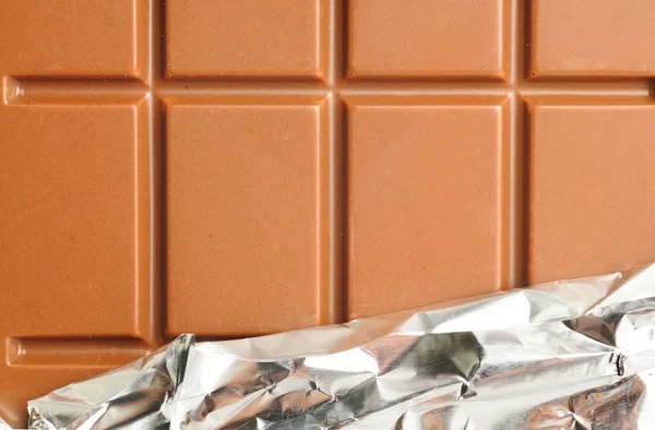 Zbliżenie czekolady z folią — Zdjęcie stockowe