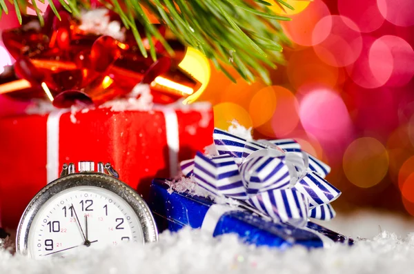 Gift boxes and clock — Stock Photo, Image