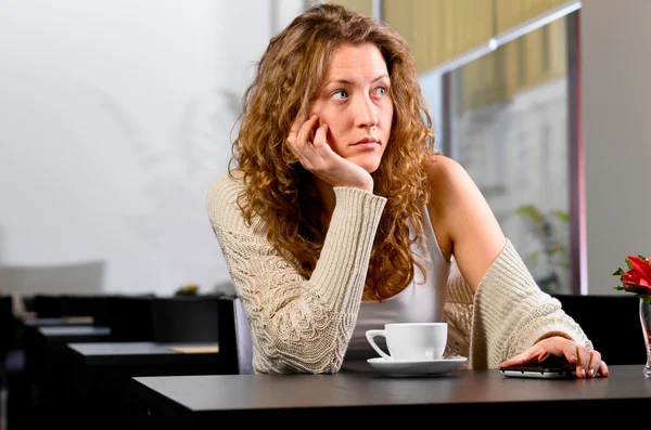 Young woman is waiting for someone — Stock Photo, Image