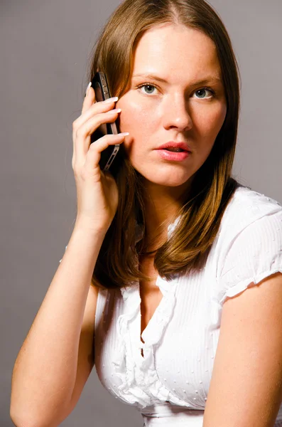 Woman is talking phone — Stock Photo, Image