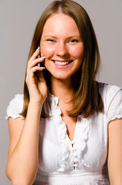 Woman is talking phone — Stock Photo, Image