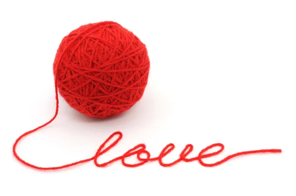 Hilo de bola con la palabra 'amor' — Foto de Stock