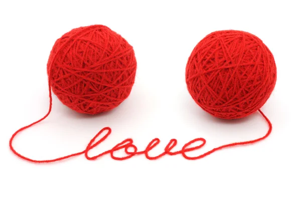 Garnkugeln mit dem Wort "Liebe" — Stockfoto