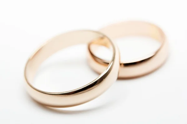 stock image Two weddings rings on white fabric