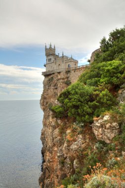 Old castle on cliff clipart