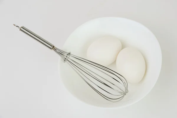 Two white eggs in a bowl — Stock Photo, Image