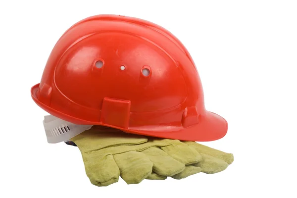 Červená helma s rukavicí — Stock fotografie