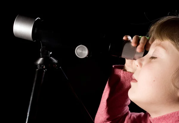 Girl with telescope — Stock Photo, Image