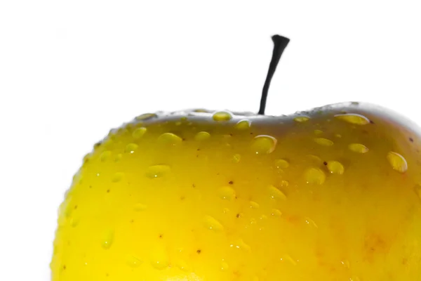 Droppar på gula äpple — Stockfoto