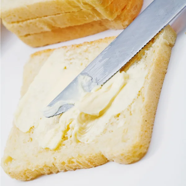 Mantequilla sobre pan — Foto de Stock