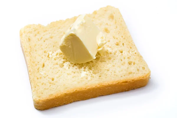 Butter on bread — Stock Photo, Image