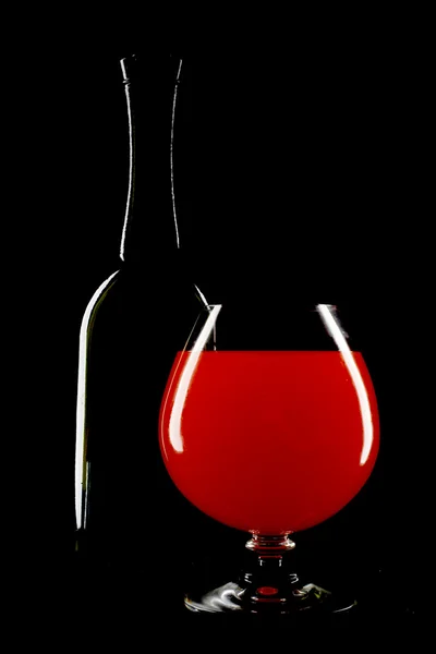Láhev vína a sklenice na víno — Stock fotografie