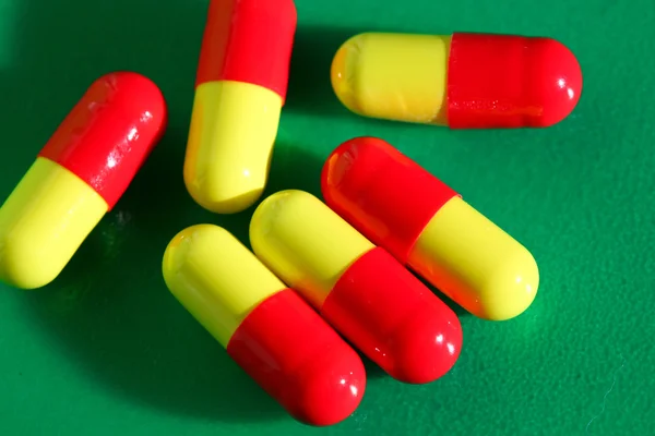 Tabletki na zielono — Zdjęcie stockowe