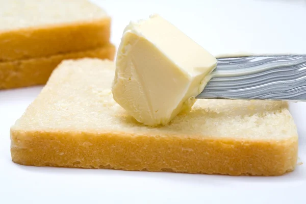 Butter, bread and knife — Stock Photo, Image