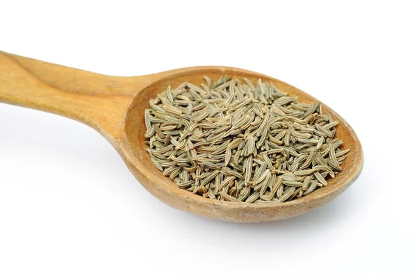 Cumin seeds in a spoon — Stock Photo, Image