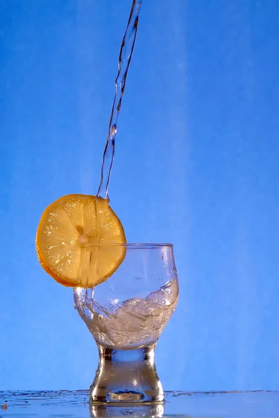 Water and lemon — Stock Photo, Image