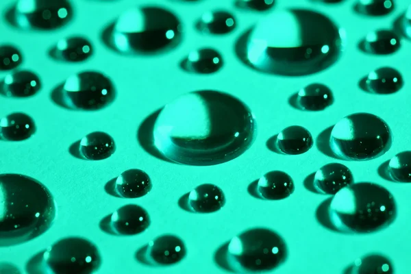 Vanddråber på grønt glas - Stock-foto