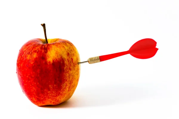Apple with red darts — Stock Photo, Image