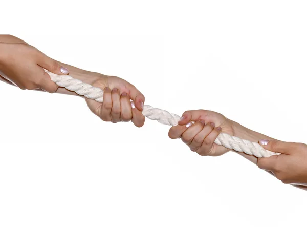 Las manos de la mujer tiran de la cuerda floja —  Fotos de Stock