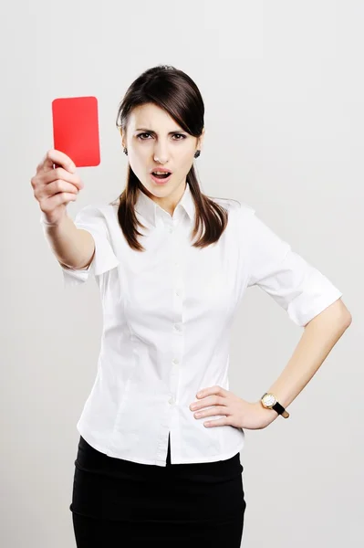 Жінка показує червону картку — стокове фото
