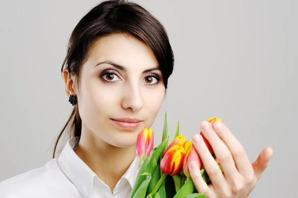 Woman with tulip — Stock Photo, Image